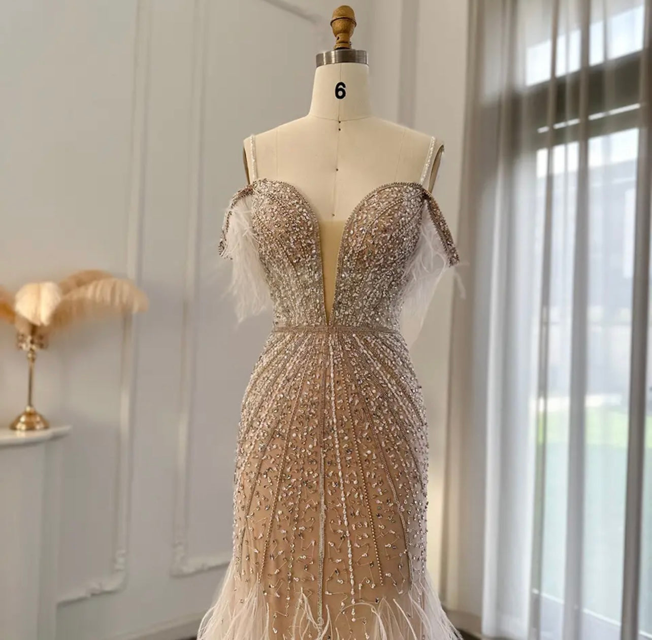Sequin formal dress ball gown champagne evening dress with feather detail