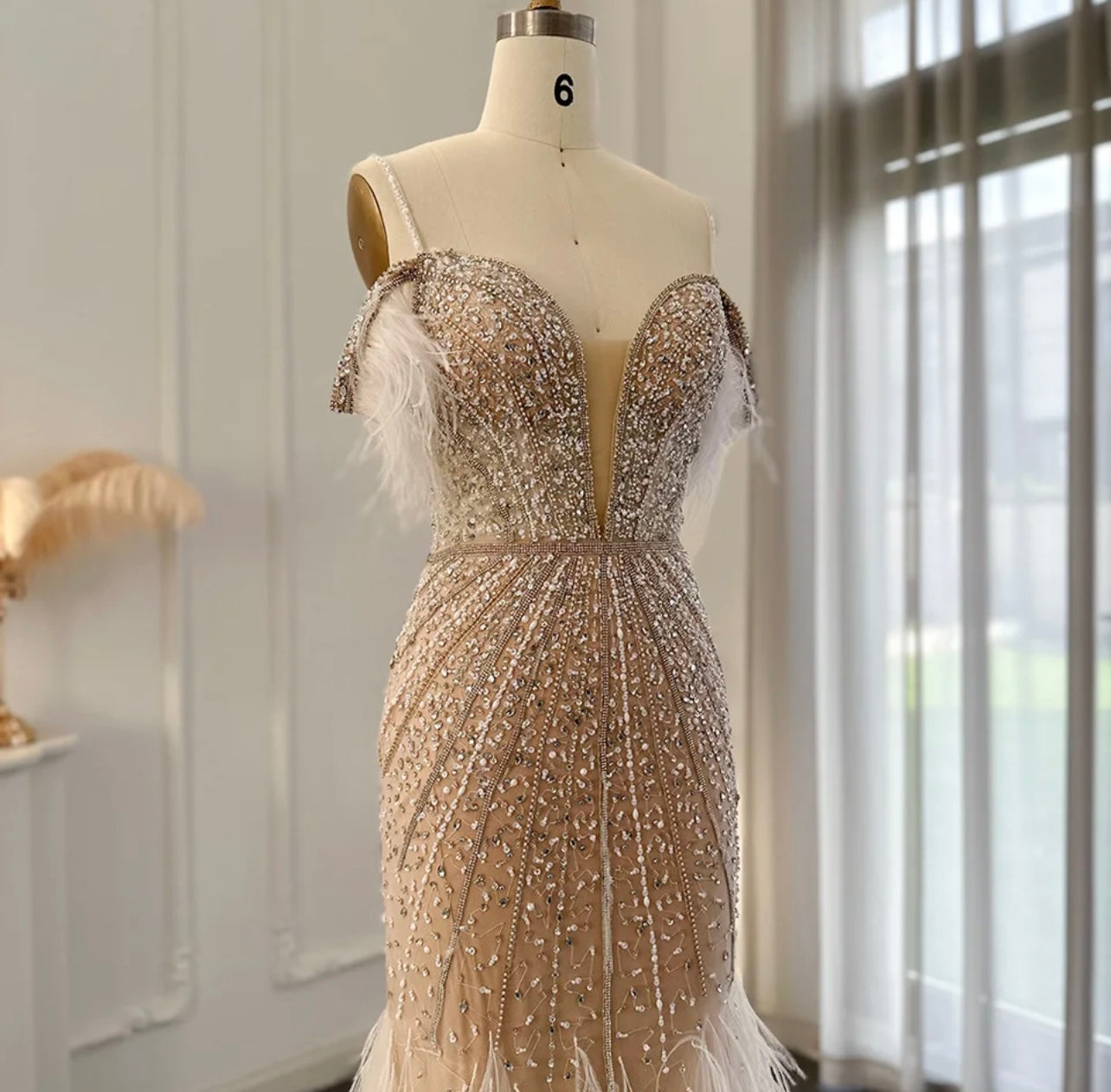 Sequin formal dress ball gown champagne evening dress with feather detail