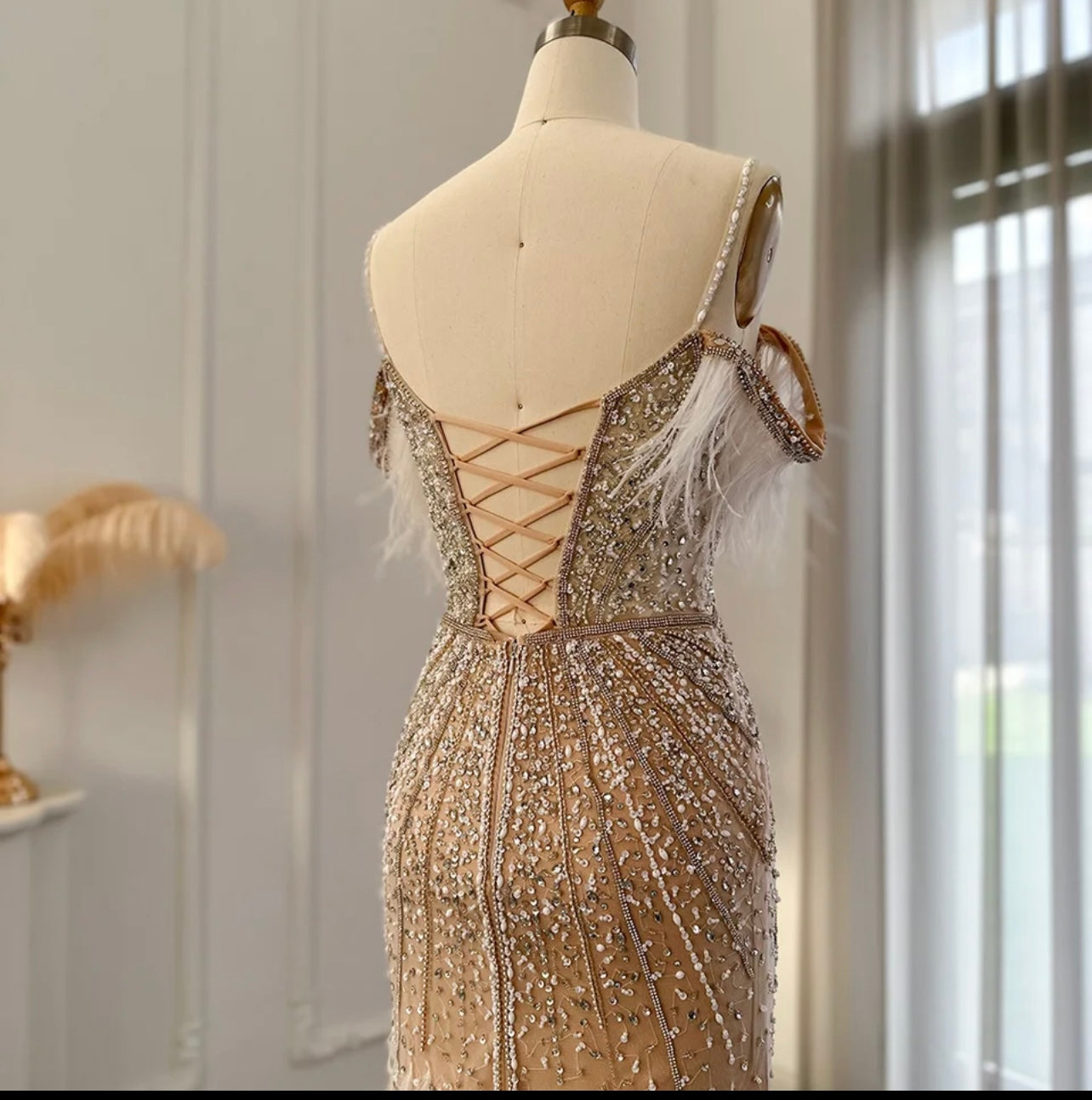 Sequin formal dress ball gown champagne evening dress with feather detail